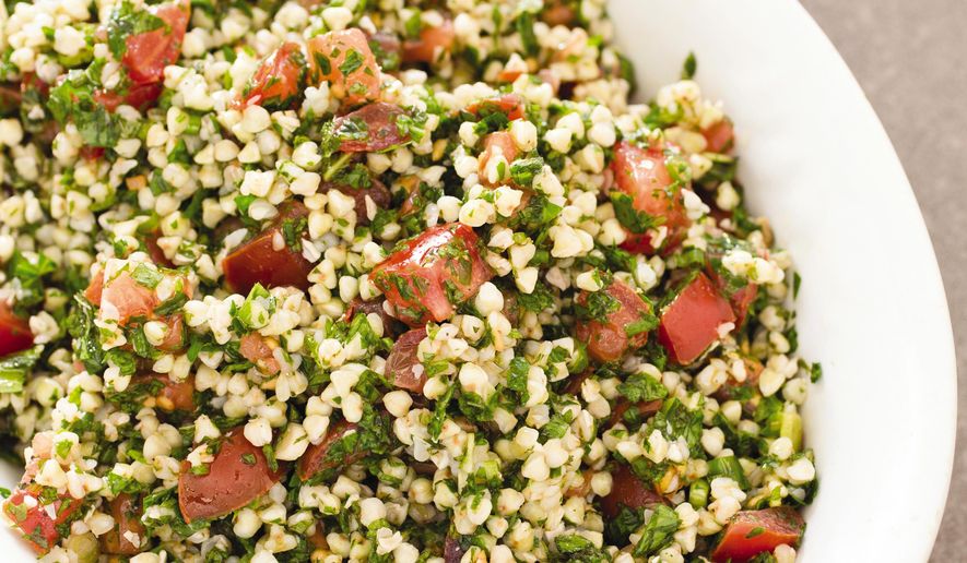 This undated photo provided by America's Test Kitchen in December 2018 shows Tabbouleh in Brookline, Mass. This recipe appears in the cookbook "Complete Mediterranean." (Carl Tremblay/America's Test Kitchen via AP)