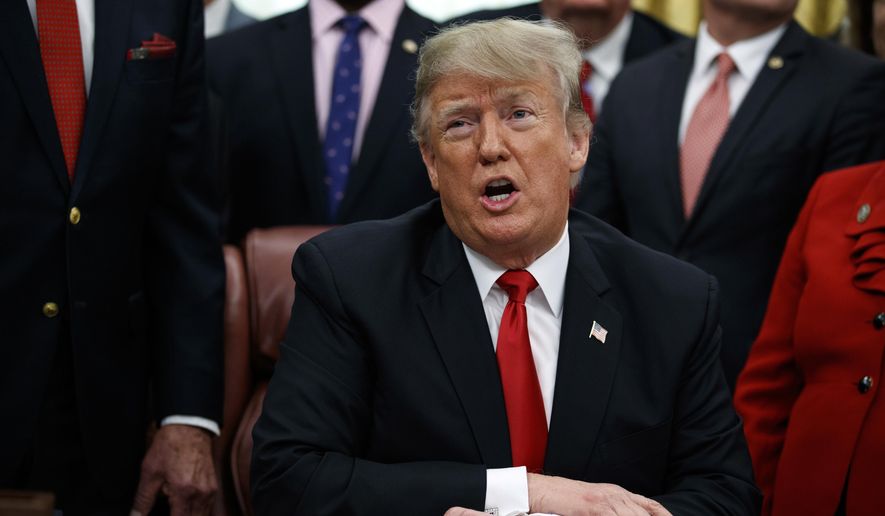 In this Friday, Dec. 21, 2018, file photo, President Donald Trump makes a statement on the possible government shutdown before signing criminal just reform legislation in the Oval Office of the White House, in Washington. (AP Photo/Evan Vucci, File)