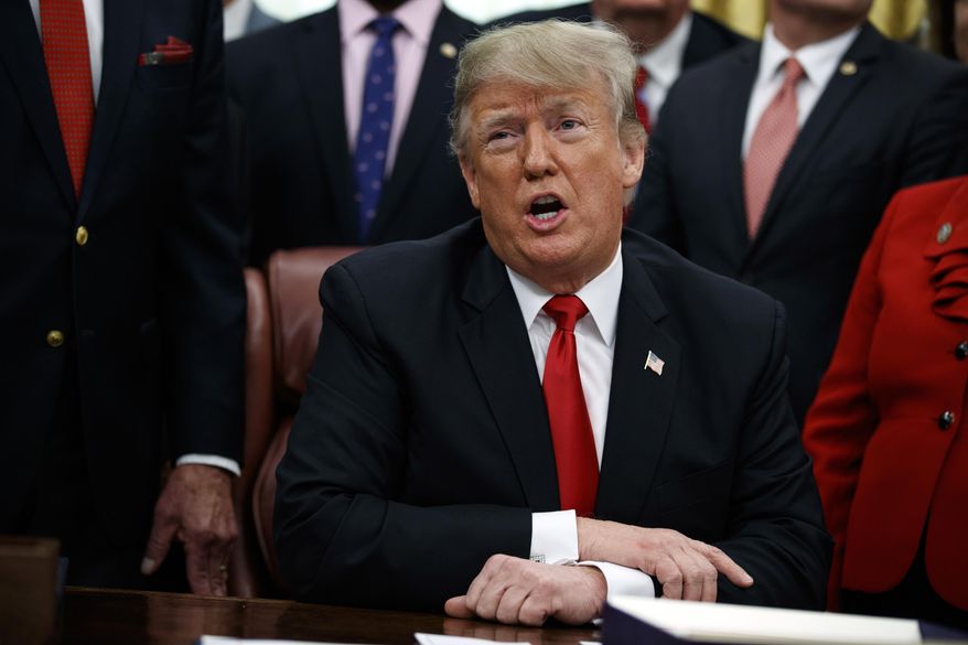 In this Friday, Dec. 21, 2018, file photo, President Donald Trump makes a statement on the possible government shutdown before signing criminal just reform legislation in the Oval Office of the White House, in Washington. (AP Photo/Evan Vucci, File)