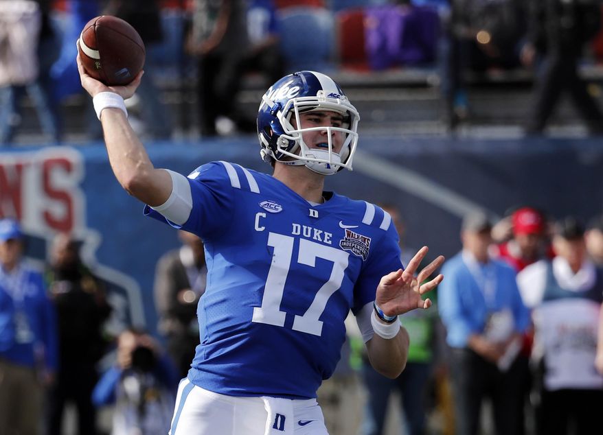 Duke quarterback Daniel Jones (17) passes against Temple during the first half of the Independence Bowl, an NCAA college football game in Shreveport, La., Thursday, Dec. 27, 2018. (AP Photo/Rogelio V. Solis)
