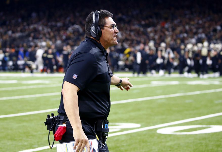 Carolina Panthers head coach Ron Rivera calls out from the sideline in the first half of an NFL football game against the New Orleans Saints in New Orleans, Sunday, Dec. 30, 2018. (AP Photo/Butch Dill)