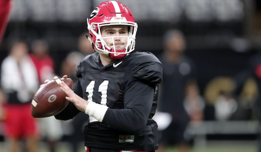 Georgia quarterback Jake Fromm (11) practices at the Superdome in New Orleans, Friday, Dec. 28, 2018. Georgia will face Texas in the Sugar Bowl NCAA college football game on Jan. 1, 2019. (AP Photo/Gerald Herbert)