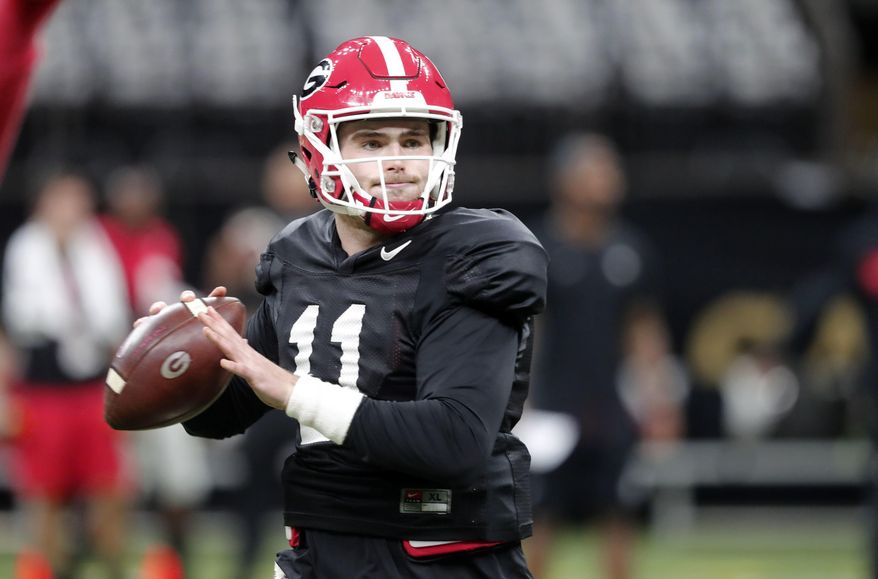 Georgia quarterback Jake Fromm (11) practices at the Superdome in New Orleans, Friday, Dec. 28, 2018. Georgia will face Texas in the Sugar Bowl NCAA college football game on Jan. 1, 2019. (AP Photo/Gerald Herbert)