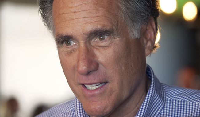 Mitt Romney speaks with customers during a campaign stop at the R&amp;R BBQ restaurant on Tuesday, June 26, 2018, in South Jordan, Utah. (AP Photo/Rick Bowmer) 