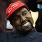 Rapper Kanye West smiles as he listens to a question from a reporter during a meeting in the Oval Office of the White House with President Donald Trump, Thursday, Oct. 11, 2018, in Washington. (AP Photo/Evan Vucci)  ** FILE **