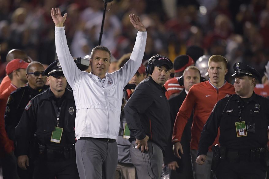Ohio State coach Urban Meyer celebrates the team's 28-23 win over Washington during the Rose Bowl NCAA college football game Tuesday, Jan. 1, 2019, in Pasadena, Calif. (AP Photo/Mark J. Terrill)