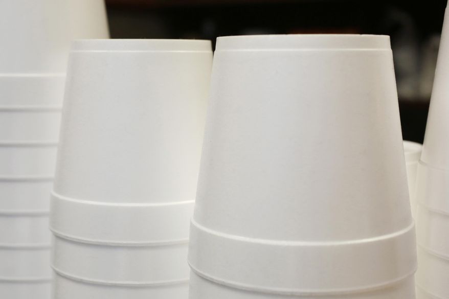 FILE - In this Feb. 14, 2013 file photo, polystyrene foam soup containers are stacked in a New York restaurant. The new year means no more plastic foam coffee cups, takeout containers or packing peanuts in most places in the nation's largest city. New York City's long-planned ban took effect on Tuesday, Jan. 1, 2019. (AP Photo/Mark Lennihan, File)