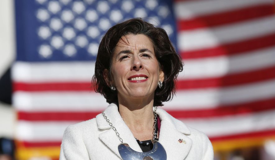 Rhode Island Gov. Gina Raimondo stands on the State House steps after taking the oath of office in Providence, R.I., Tuesday, Jan. 1, 2019. Raimondo was sworn into a second term in office, promising to continue bringing change to set the state on a &amp;quot;path for enduring success.&amp;quot; (AP Photo/Michael Dwyer)
