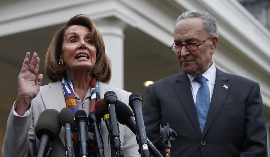 House Democratic leader Nancy Pelosi of California, left, the House Speaker-designate, and Senate Minority Leader Chuck Schumer, D-N.Y., speak to the media after meeting with President Donald Trump, Wednesday, Jan. 2, 2019, on border security at the White House in Washington. (AP Photo/Jacquelyn Martin)