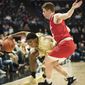 Wake Forest guard Brandon Childress (0) dribbles around Cornell guard Bryan Knapp (5) during the second half of an NCAA college basketball game Wednesday, Jan. 2, 2019, in Winston-Salem, N.C. (Allison Lee Isley/The Winston-Salem Journal via AP)