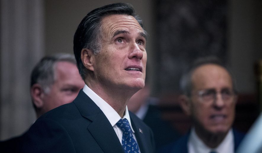 Sen. Mitt Romney, R-Utah, waits to participate in a mock swearing in ceremony in the Old Senate Chamber on Capitol Hill in Washington, Thursday, Jan. 3, 2019, as the 116th Congress begins. (AP Photo/Andrew Harnik)