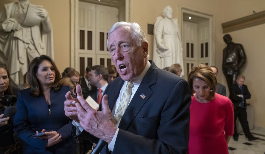 House Majority Leader Steny Hoyer, D-Md., center, and Speaker of the House Nancy Pelosi, D-Calif., push back on President Donald Trump&#39;s demand for funding to build a wall on the US-Mexico border as the partial government shutdown is in its second week, at the Capitol in Washington, Thursday, Jan. 3, 2019. (AP Photo/J. Scott Applewhite) ** FILE **