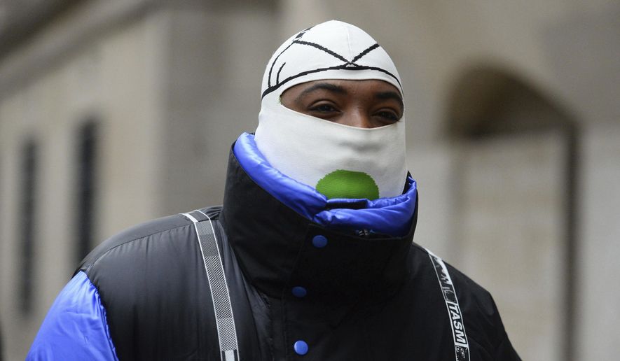 A$AP Bari, real name Jabari Shelton, arrives at the Old Bailey in central London, Thursday Jan. 3, 2019. The American hip hop impresario and fashion designer has been fined for sexual assault after pleading guilty in a London court. (Kirsty O'Connor/PA via AP)