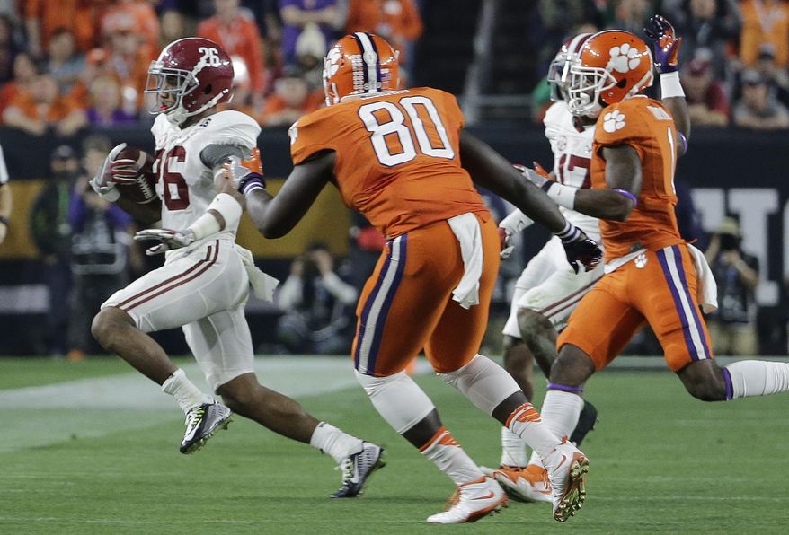 FILE - In this Jan. 11, 2016, file photo, Alabama's Marlon Humphrey catches an onside kick during the second half of the NCAA college football playoff championship game against Clemson, in Glendale, Ariz. When thinking of Alabama coach Nick Saban, a gambler or risk taker isn’t the first thing that comes to mind. But when the time is right, the coach has stepped outside the box. In January 2016, Saban's fourth-quarter onside kick call propelled Alabama on to a 45-40 win over Clemson by not only setting up a touchdown drive but keeping Deshaun Watson & Co. off the field. (AP Photo/David J. Phillip)