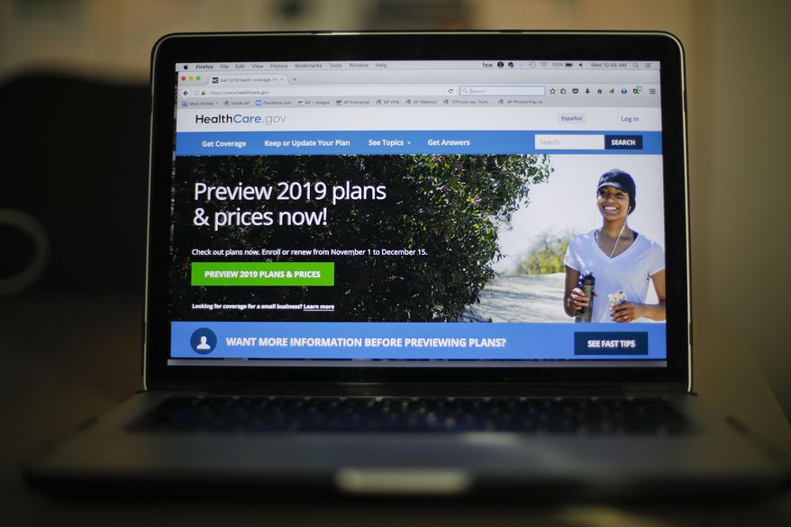 FILE - In this Oct. 31, 2018, file photo, the HealthCare.gov website is photographed in Washington. The government says 8.4 million Americans have signed up for coverage next year under the Obama health law, even as supporters of the law appealed a court ruling declaring it unconstitutional. (AP Photo/Pablo Martinez Monsivais, File)