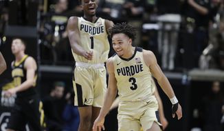 Purdue guard Carsen Edwards (3) and forward Aaron Wheeler (1) celebrate a basket against Iowa during the first half of an NCAA college basketball game in West Lafayette, Ind., Thursday, Jan. 3, 2019. (AP Photo/Michael Conroy)