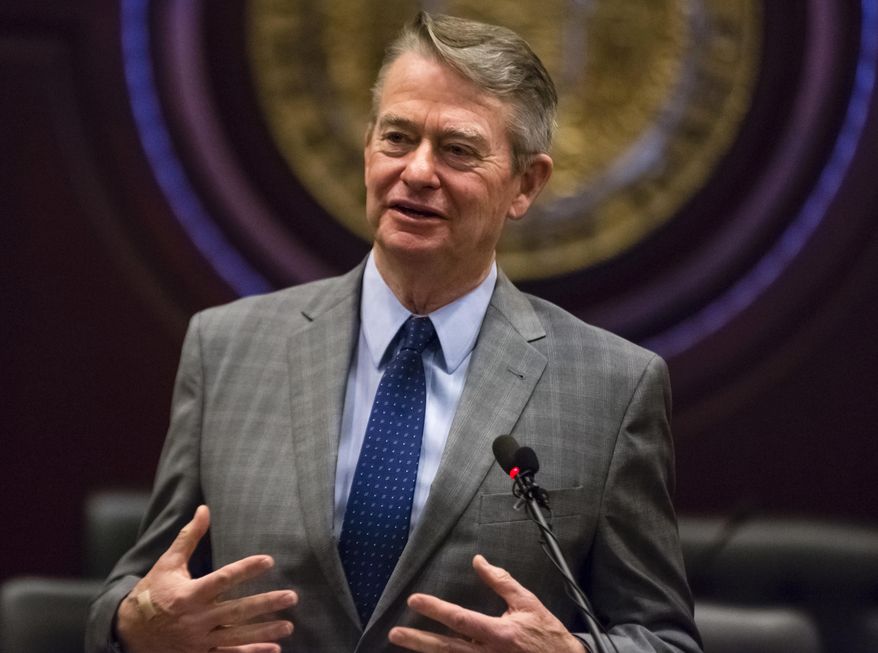 Idaho Gov.-elect Brad Little answers a reporter's question at the State Capitol building Thursday, Jan. 3, 2019 in Boise, Idaho. Little says he's committed to implementing a voter-approved expansion of Medicaid coverage but wants to make sure the state doesn't create an incentive for people not to work. (AP Photo/Otto Kitsinger)