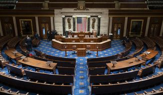 The chamber of the House of Representatives is seen before convening for the first day of the 116th Congress with Democrats holding the majority, at the Capitol in Washington, Thursday, Jan. 3, 2019. (AP Photo/J. Scott Applewhite)