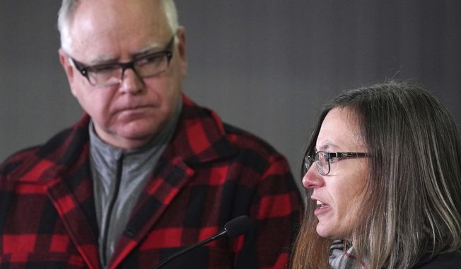 Sarah Strommen, currently an assistant commissioner at the Department of Natural Resources, answers questions after Gov.-elect Tim Walz announced she will lead the DNR, the first woman appointed, during a news conference Thursday, Jan. 3, 2019 at Bill Sorg&#x27;s Dairy Farm in Hastings, Minn. (Anthony Souffle/Star Tribune via AP)