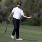 Bubba Watson reacts to his shot from the fourth fairway during the first round of the Tournament of Champions golf event, Thursday, Jan. 3, 2019, at Kapalua Plantation Course in Kapalua, Hawaii. (AP Photo/Matt York)