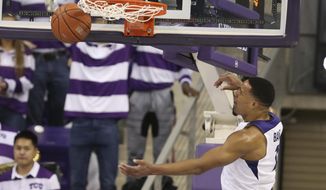 TCU guard Desmond Bane scores past Baylor on a fast break in the first half of an NCAA college basketball game, Saturday, Jan. 5, 2019, in Fort Worth, Texas. (Rod Aydelotte/Waco Tribune Herald via AP)