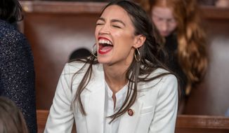 &quot;Call me a radical,&quot; said Rep. Alexandria Ocasio-Cortez, New York Democrat, on &quot;60 Minutes.&quot; She&#39;s frequently referred to as &quot;AOC.&quot; (Associated Press)