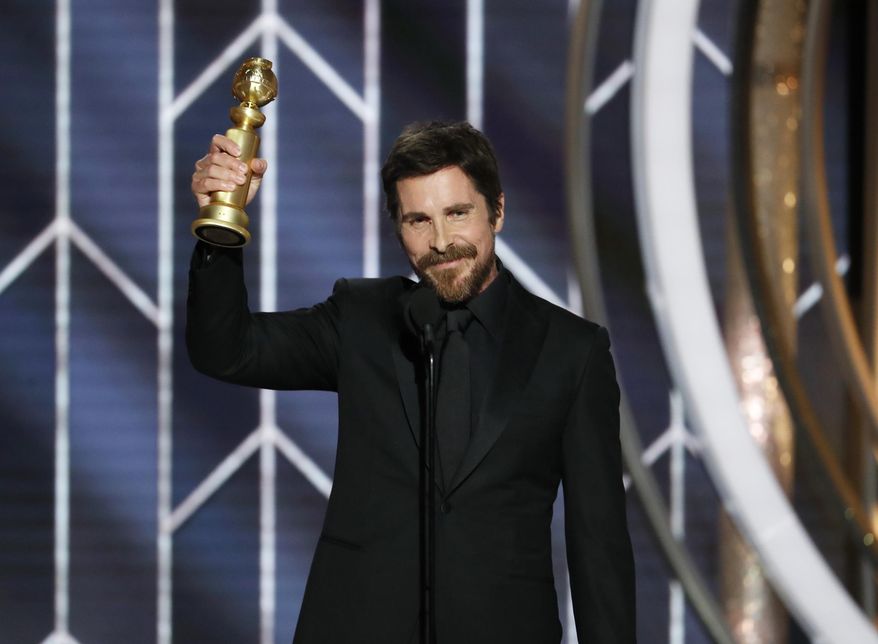 This image released by NBC shows Christian Bale accepting the award for best actor in motion picture musical or comedy for his role in &amp;quot;Vice&amp;quot; during the 76th Annual Golden Globe Awards at the Beverly Hilton Hotel on Sunday, Jan. 6, 2019, in Beverly Hills, Calif. (Paul Drinkwater/NBC via AP)