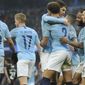 Manchester City&#x27;s Kyle Walker, No 2, celebrates with teammates after Rotherham&#x27;s Semi Ajayi scored an own goal during the English FA Cup third round soccer match between Manchester City and Rotherham United at Etihad stadium in Manchester, England, Sunday, Jan. 6, 2019. (AP Photo/Rui Vieira)