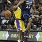Minnesota Timberwolves&#39; Andrew Wiggins tries to pass the ball over Los Angeles Lakers&#39; Lance Stephenson in the first half of an NBA basketball game Sunday, Jan. 6, 2019, in Minneapolis. (AP Photo/Stacy Bengs)