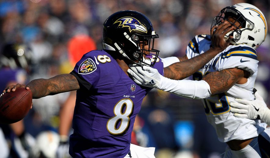 Quarterback Lamar Jackson and the Baltimore Ravens were held to just 83 yards entering the fourth quarter and finished with 229 in an AFC wild-card loss to the Los Angeles Chargers on Sunday. (Associated Press)