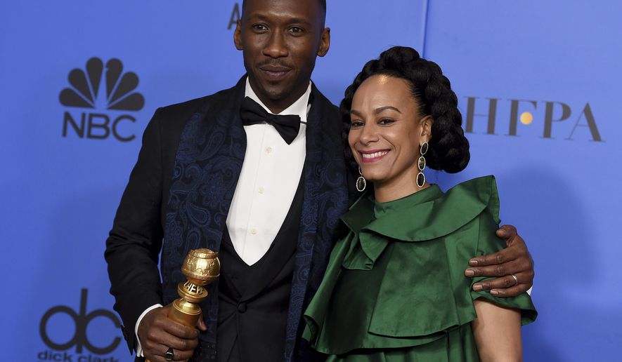Mahershala Ali, left, winner of the award for best performance by an actor in a supporting role in any motion picture for "Green Book," and Amatus Sami-Karim pose in the press room at the 76th annual Golden Globe Awards at the Beverly Hilton Hotel on Sunday, Jan. 6, 2019, in Beverly Hills, Calif. (Photo by Jordan Strauss/Invision/AP)