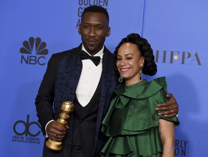 Mahershala Ali, left, winner of the award for best performance by an actor in a supporting role in any motion picture for "Green Book," and Amatus Sami-Karim pose in the press room at the 76th annual Golden Globe Awards at the Beverly Hilton Hotel on Sunday, Jan. 6, 2019, in Beverly Hills, Calif. (Photo by Jordan Strauss/Invision/AP)
