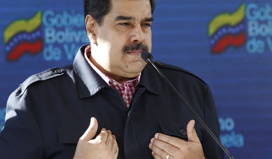 FILE - In this Dec. 9, 2018 file photo, Venezuela&#39;s President Nicolas Maduro speaks after voting in local elections in Caracas, Venezuela. A Venezuelan Supreme Court justice who has been a longtime government loyalist has fled to the U.S., on Jan. 2019, saying he’s protesting President Nicolas Maduro’s plans for a second term. Christian Zerpa told Miami-based broadcaster EVTV that Venezuela’s high court has become an appendage of Maduro’s inner circle. (AP Photo/Ariana Cubillos, File)
