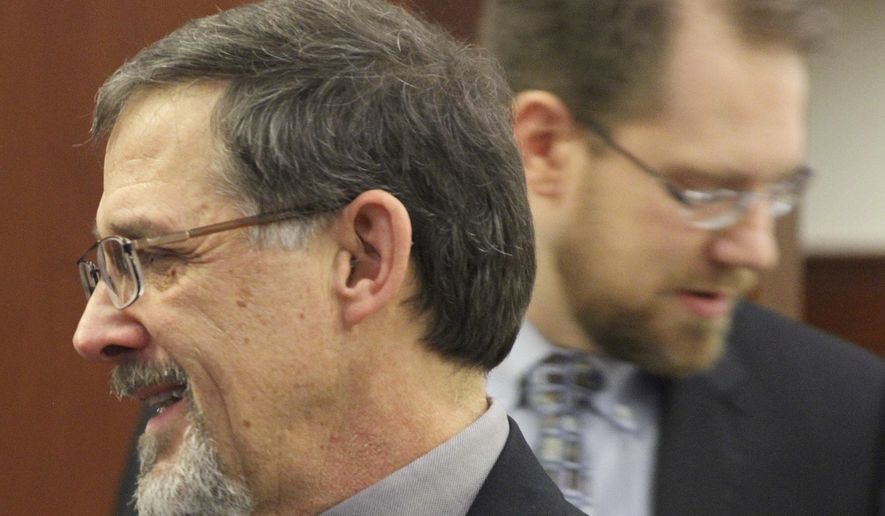 FILE - In this Tuesday, Jan. 16, 2018 file photo State Rep. George Rauscher, a Republican from Sutton, left, is shown before the start of the Alaska legislative session at the Alaska State Capitol in Juneau, Alaska. Rauscher has proposed barring the state from paying for gender confirmation surgery and limiting what is taught in sex education classes. The measures from Rauscher were among more than 40 bills and proposed constitutional amendments released Monday, Jan. 7, 2019, ahead of the new legislative session, which starts Jan. 15.(AP Photo/Mark Thiessen,File)