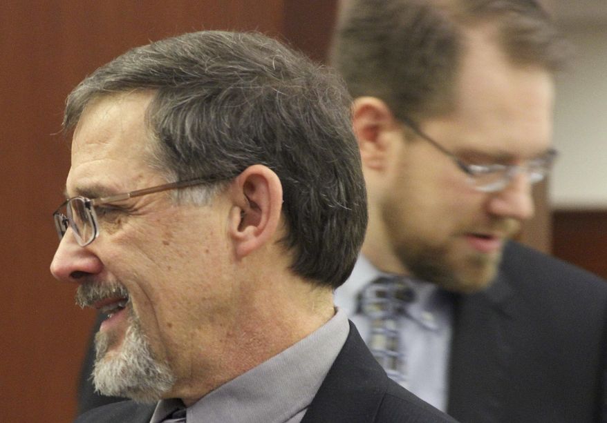 FILE - In this Tuesday, Jan. 16, 2018 file photo State Rep. George Rauscher, a Republican from Sutton, left, is shown before the start of the Alaska legislative session at the Alaska State Capitol in Juneau, Alaska. Rauscher has proposed barring the state from paying for gender confirmation surgery and limiting what is taught in sex education classes. The measures from Rauscher were among more than 40 bills and proposed constitutional amendments released Monday, Jan. 7, 2019, ahead of the new legislative session, which starts Jan. 15.(AP Photo/Mark Thiessen,File)