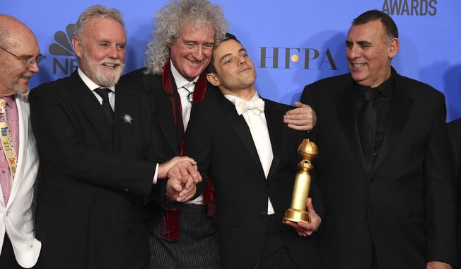 Jim Beach, from left, Roger Taylor, Brian May, Rami Malek and Graham King pose in the press room at the 76th annual Golden Globe Awards at the Beverly Hilton Hotel on Sunday, Jan. 6, 2019, in Beverly Hills, Calif. (Photo by Jordan Strauss/Invision/AP)