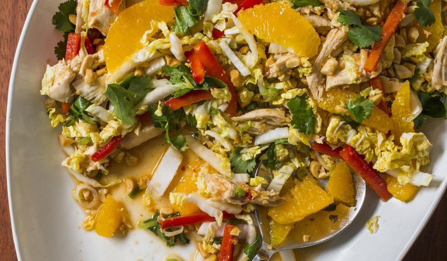This undated photo provided by America's Test Kitchen in December 2018 shows Chinese Chicken Salad in Brookline, Mass. This recipe appears in the cookbook "Nutritious Delicious." (Carl Tremblay/America's Test Kitchen via AP)
