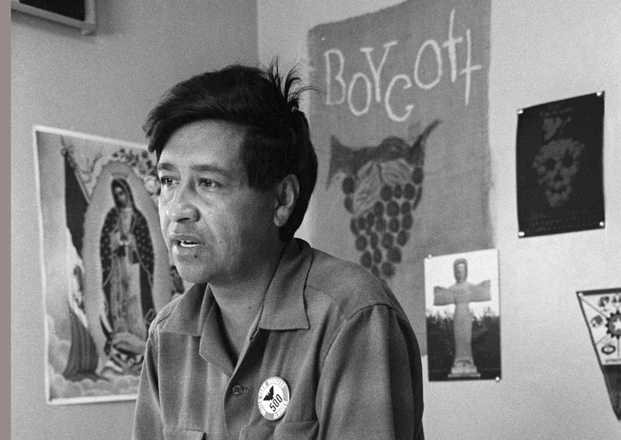 In this 1965 file photo, a Cesar Chavez, a farm worker labor organizer and leader of the California grape strike, speaks from a Delano, Calif., union office. A New Mexico state lawmaker is proposing a state holiday in honor of the Yuma, Arizona-born Chavez and the late U.S. Sen. Dennis Chavez of New Mexico. (AP Photo, George Brich, File)
