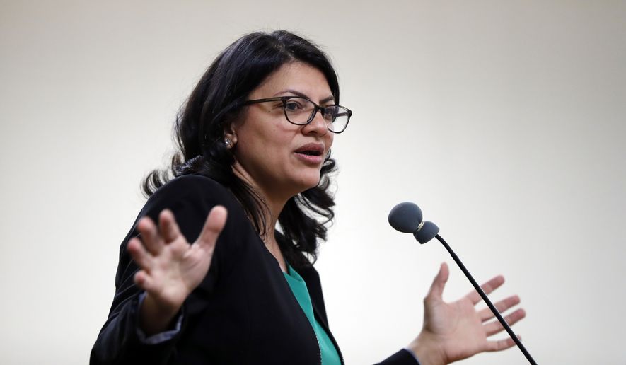 In this photo, Rashida Tlaib, then a Democratic candidate for Michigan&#x27;s 13th Congressional District, speaks at a rally in Dearborn, Mich., Friday, Oct. 26, 2018. Ms. Tlaib went on to win the race and become one of the two first Muslim women to serve in the U.S. House. (AP Photo/Paul Sancya) **FILE**