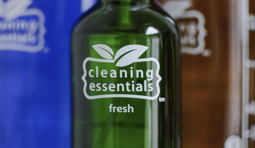 This photo provided by Cleaning Essentials shows some of the company's reusable glass cleaning bottles available online and in stores. (Ali Rainer/Cleaning Essentials via AP)