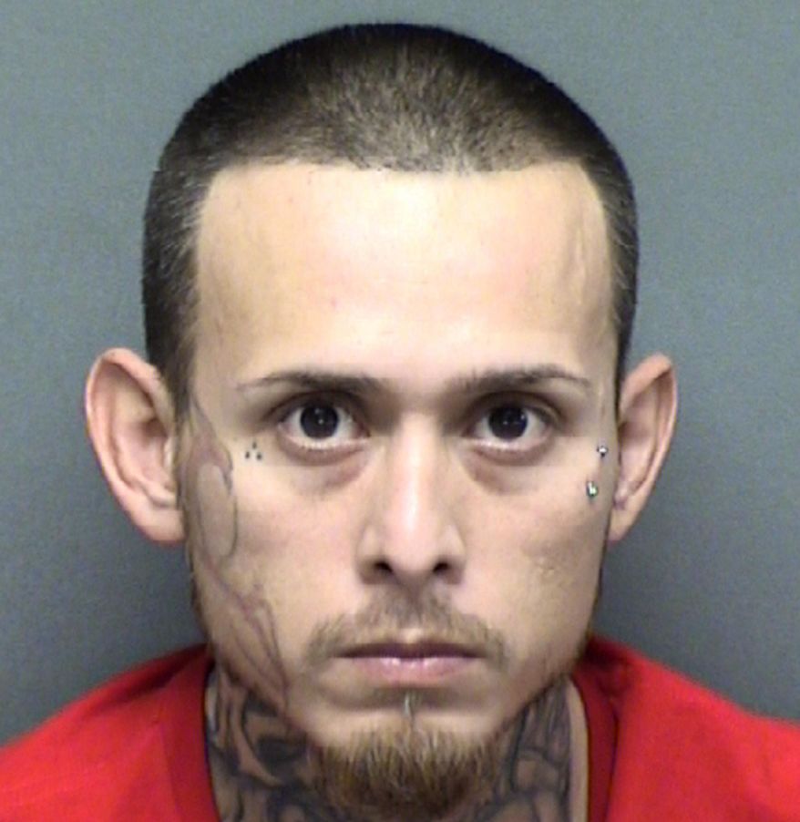 This undated photo provided by the Bexar County Sheriff's Office in San Antonio, Texas shows Christopher Davila. Police in San Antonio say the reported abduction of Davila's missing 8-month-old boy was staged to cover up "foul play" involving the child. Police Chief William McManus declined to elaborate Monday, Jan.7, 2018, on whether he believes King Jay Davila is alive. He would only say that investigators "believe there was foul play." Christopher Davila, told police Friday that his son was in his car when the vehicle was stolen. (Bexar County Sheriff's Office via AP)