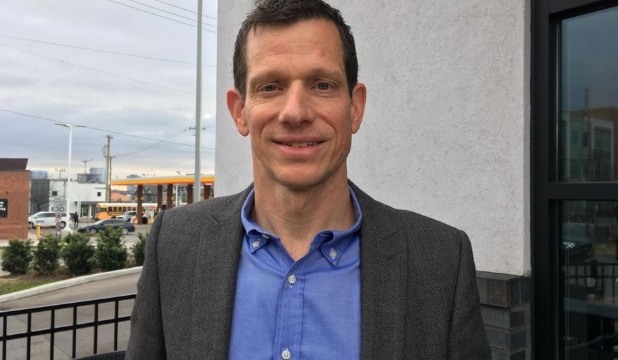 James Mackler poses for a portrait Tuesday, Jan. 8, 2018, in Nashville, Tenn. Mackler, a Democratic Nashville attorney and former Army helicopter pilot, is the first candidate to announce a 2020 bid for the seat Republican U.S. Sen. Lamar Alexander will leave after his term. (AP Photo/Jonathan Mattise)