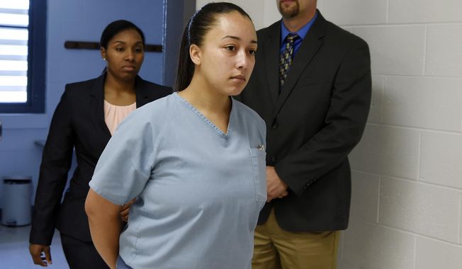 File- This May 23, 2018, file photo shows Cyntoia Brown, entering her clemency hearing at Tennessee Prison for Women in Nashville, Tenn. Tennessee Gov. Bill Haslam on Monday, Jan. 7, 2019, granted executive clemency to Brown, serving a life sentence for murder who says she was a victim of sex trafficking. The outgoing Republican governor, whose term ends in just two weeks, chose to show mercy to the now 30-year-old Brown by releasing her Aug. 7. (Lacy Atkins /The Tennessean via AP, Pool, File)