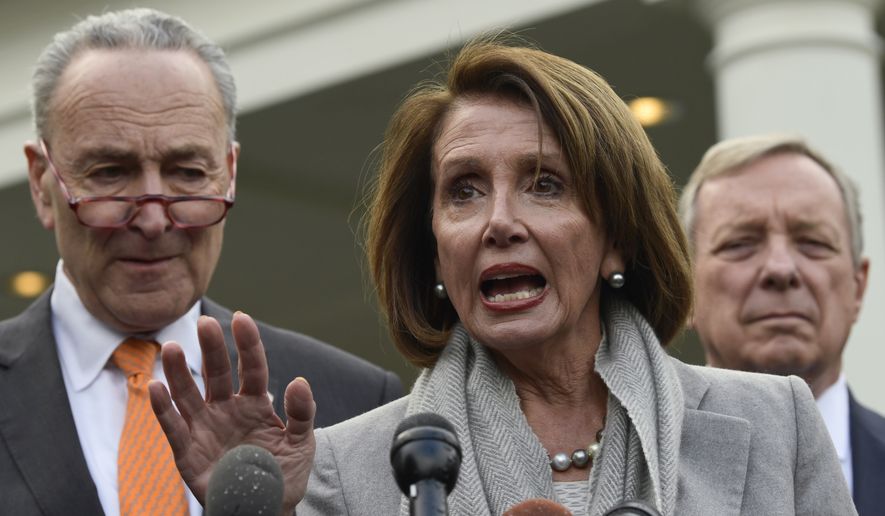 House Speaker Nancy Pelosi of Calif., center, speaks as she stands next to Senate Minority Leader Sen. Chuck Schumer of N.Y., left, and Sen. Dick Durbin, D-Ill., right, following their meeting with President Donald Trump at the White House in Washington, Wednesday, Jan. 9, 2019. (AP Photo/Susan Walsh) ** FILE **