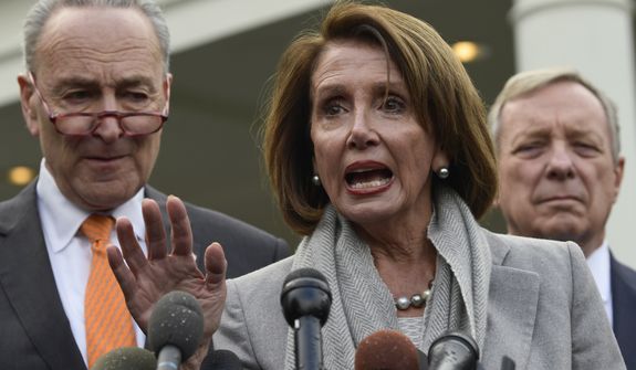 House Speaker Nancy Pelosi of Calif., center, speaks as she stands next to Senate Minority Leader Sen. Chuck Schumer of N.Y., left, and Sen. Dick Durbin, D-Ill., right, following their meeting with President Donald Trump at the White House in Washington, Wednesday, Jan. 9, 2019. (AP Photo/Susan Walsh)
