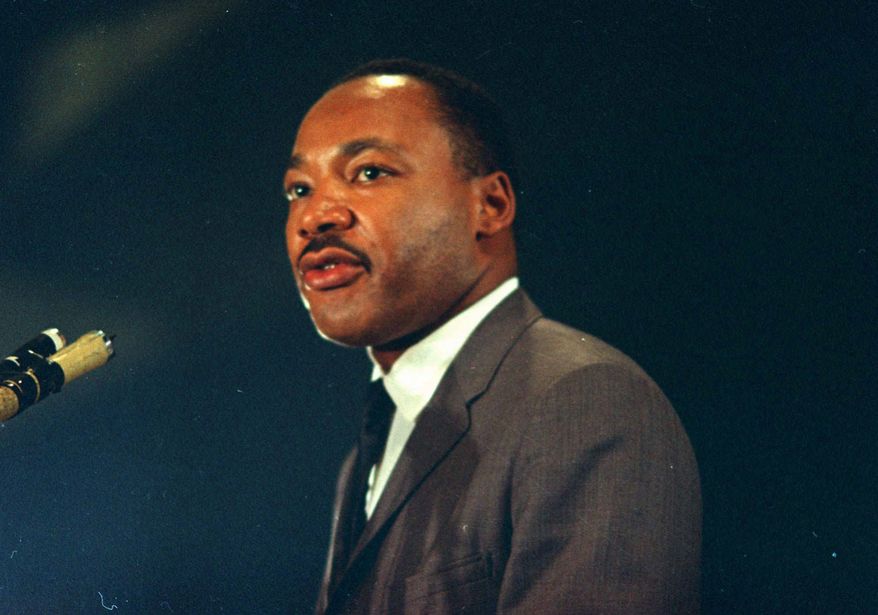 Dr. Martin Luther King speaks March 25, 1967 at the Chicago peace march. (AP Photo/Chick Harrity)