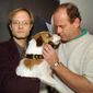 Actor Kelsey Grammer of the television show, &quot;Frasier,&quot; gets a kiss from the dog, who plays Eddie, as co-star David Hyde Pierce holds Eddie during the opening day of the National Association of Television Program Executives convention Tuesday, Jan. 23, 1996, in Las Vegas. (AP Photo/Lennox McLendon)
