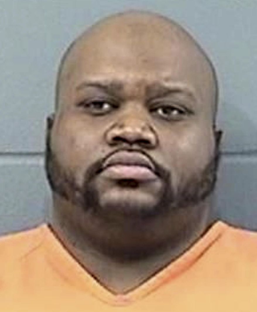 This undated photo provided by the Geary County Detention Center in Junction City, Kan., shows Mushaun Baker. Baker is one of two men that have been charged with capital murder for the alleged contract killing of a pregnant Kansas mother who was found dead on Christmas Day, according to investigators. (Geary County Detention Center via AP)