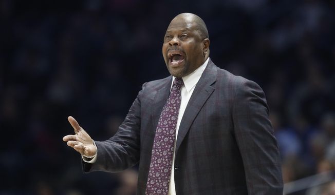 Georgetown head coach Patrick Ewing reacts at the bench during the first half of an NCAA college basketball game against Xavier, Wednesday, Jan. 9, 2019, in Cincinnati. (AP Photo/John Minchillo) ** FILE **