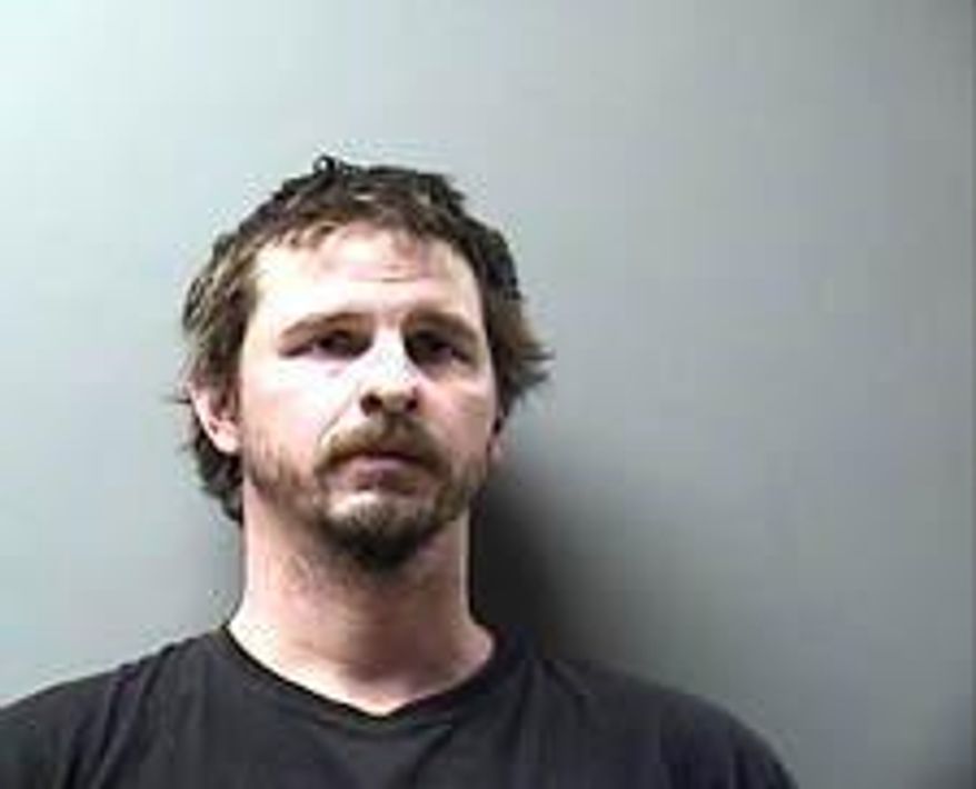 This photo provided by Wapello County Jail in Ottumwa, Iowa shows Lee Ryals. Ryals faces felony charges after officials say he drunkenly fired a rifle from the front deck of a camper hitting a woman in her home. The Iowa Department of Natural Resources says the shooting happened Friday, Jan. 4, 2019 in Wapello County, Iowa. (Wapello County Jail via AP)